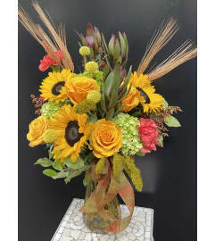 Marivel's Harvest Beauty. An arrangement by Marivel's Florist and Gifts.