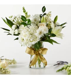 To New Beginnings. An arrangement by Floral Insight.