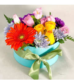 Signature Collection Orange Citrus. An arrangement by Arum Lily Flower Shop Edmonton.