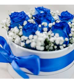 Signature Collection True Blue Hearts. An arrangement by Arum Lily Flower Shop Edmonton.