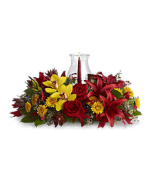 Elegant Glow of Gratitude Centerpiece. An arrangement by Elegant Florist.