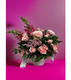 Blushing baby girl. An arrangement by Floral Classics.