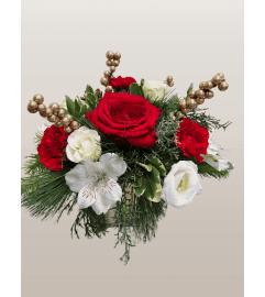 Oh Snowy Night. An arrangement by Harriet's Flower and Gift Shop.