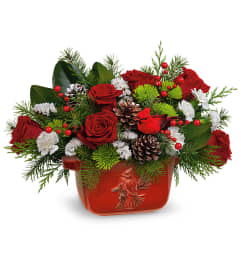 Van Veghel's Classic Cardinal Centerpiece. An arrangement by Van Veghel's Flowers.