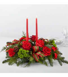 christmas red centerpiece. An arrangement by Conny's Flower Shop.