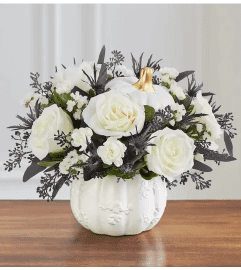 White Christmas Pumpkin. An arrangement by Anthurium Gardens Florist.