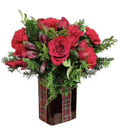 Radiant Christmas. An arrangement by Azi Flowers.