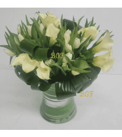 Unique White Cala and Tulipans. An arrangement by Brickell Exclusive Blooms.