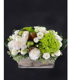 Merry Modern Grinchmas. An arrangement by Hillcrest Florist.