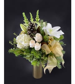 Gold and Glitter Holiday Arrangement. An arrangement by Hillcrest Florist.