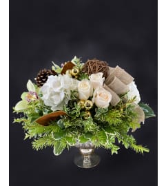 Celebration of Light. An arrangement by Hillcrest Florist.