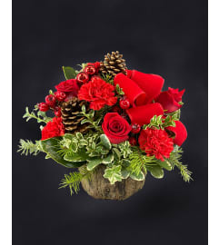 By The Fireside. An arrangement by Hillcrest Florist.