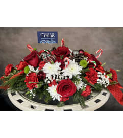 A Candy Cane Christmas. An arrangement by Say It With Flowers.