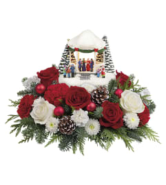 Thomas Kinkade's Christmas Singalong. An arrangement by The Village Green Florist.