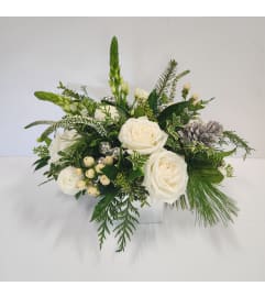 Winter whites. An arrangement by Prestige Floral. Winter whites. An arrangement by Prestige Floral.