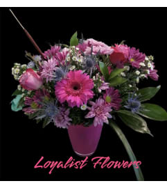 Designers Choice Vase Arrangement. An arrangement by Loyalist Flowers.
