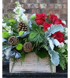 Rustic seasons greetings. An arrangement by Dupree's Root 88 Garden Center and Florist.