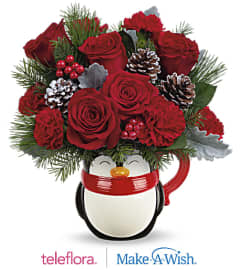 Penguin hugs. An arrangement by Big Event Floral and Decorating Co..