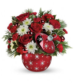 ornament red ball stars. An arrangement by Big Event Floral and Decorating Co..