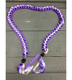 ribbon lei #74. An arrangement by Royal Louis Florist.