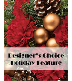 Christmas designers choice arrangements. An arrangement by Flowers By Gerry.