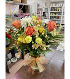 Something in the Orange. An arrangement by Jenilyn's Creations.