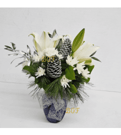 Snowy Unique Celebration. An arrangement by Brickell Exclusive Blooms. Snowy Unique Celebration. An arrangement by Brickell Exclusive Blooms.