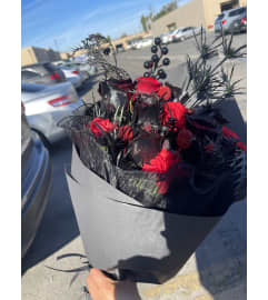 Red Loves. An arrangement by Rose Flowers.