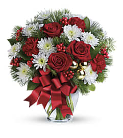 We Wish You A Merry Christmas Floral. An arrangement by Blue Ridge Flowers.