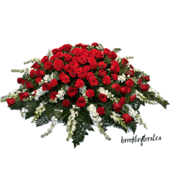 Eternally Yours Red Rose Casket Spray. An arrangement by Brooklin Floral and Garden Shoppe Inc..
