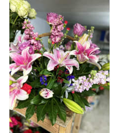 Resting Lilies Funeral Basket. An arrangement by Jenilyn's Creations.