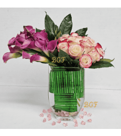 Calla Lilies And Roses Glamour. An arrangement by Aventura Glamour Flowers. Calla Lilies And Roses Glamour. An arrangement by Aventura Glamour Flowers.