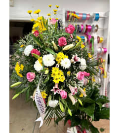 Springtime Sympathy Spray. An arrangement by Jenilyn's Creations.