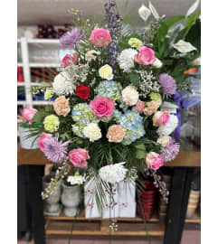 Rejoicing Heart Sympathy Spray. An arrangement by Jenilyn's Creations.