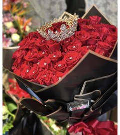 Roses and Crown Fit for A Queen. An arrangement by New Britain Flower Shop.