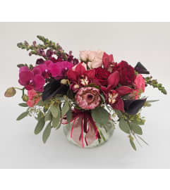 Love is Blooming by Twiggs. An arrangement by Twigs Flower Company.