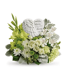 Elegant Hearts In Heaven Bouquet. An arrangement by Elegant Florist.