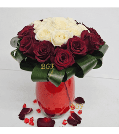 White and Red Passion Unique. An arrangement by Aventura Blooming Petals.