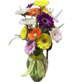 12+ Assorted Gerbera Daisies arranged in a Vase. An arrangement by Flowers by Priscilla.