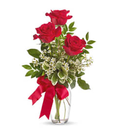 Three Red. An arrangement by Country Girl Flowers.