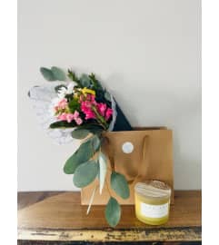 Stop and Smell the Roses Gift Package. An arrangement by Evergreen and Lily Floral Studio and Gifts.