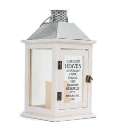 Memorial lighted lantern. An arrangement by Evergreen and Lily Floral Studio and Gifts.