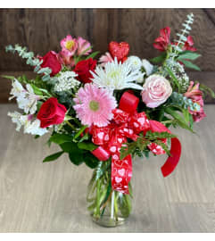Rosie Passion. An arrangement by Sussex County Florist.