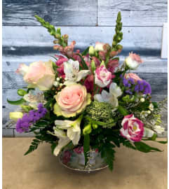 Vintage Tea Cup Floral Arrangement. An arrangement by Owen Sound Flowers.