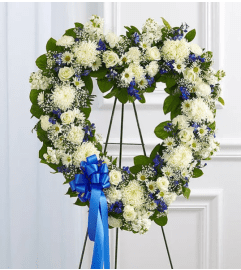 Standing open Heart Blue and White. An arrangement by Elegant Florist.