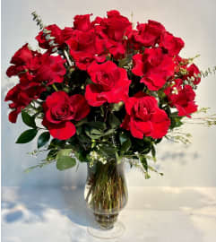 Simply Dozen Roses. An arrangement by Simply Beautiful Flowers and Events.