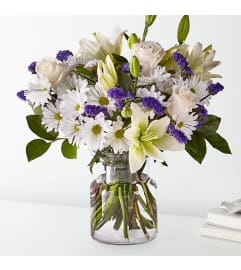 Blue and White Serenity. An arrangement by Mae's Flowers and Gifts.