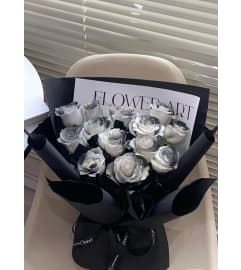 Monochrome Elegance. An arrangement by Win's Flowers.