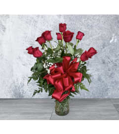 Roses Red Roses. An arrangement by Massey's House of Flowers.
