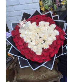 Love Buchones. An arrangement by Rose Flowers.